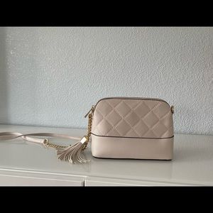 Aldo quilted cross body tassel bag